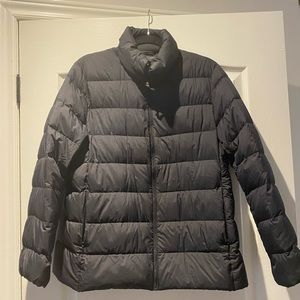 Uniqlo - Ultra light down jacket - size L- Barely worn